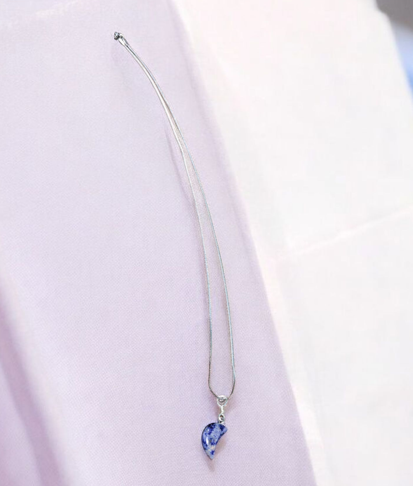 1.5mm Stainless steel silver necklace with Sodalite half moon pendant.